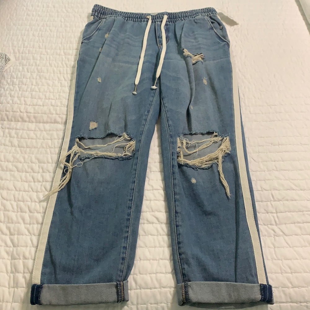 Distressed boyfriend style pants